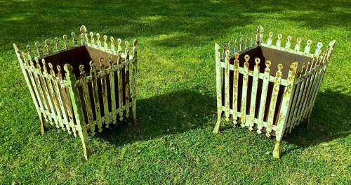 Rare C19th pair of wrought iron strapwork planters