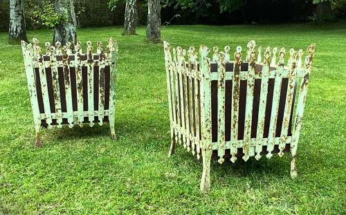 Rare C19th pair of wrought iron strapwork planters