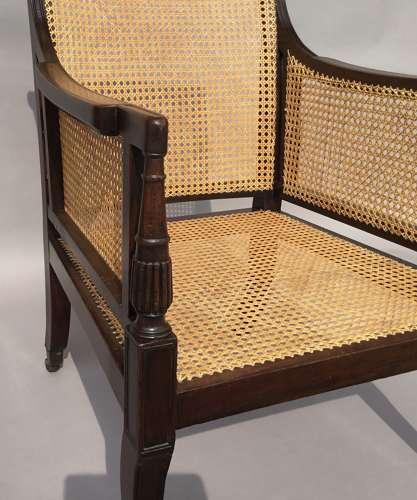A splendid Regency mahogany bergere library chair