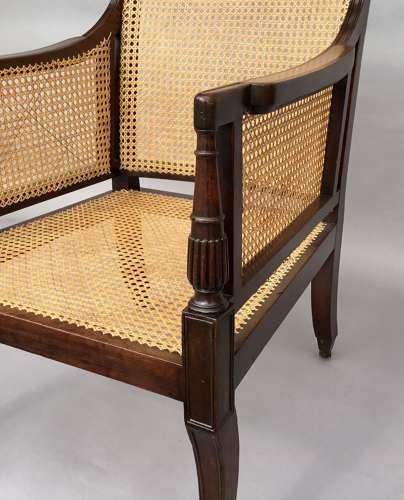 A splendid Regency mahogany bergere library chair