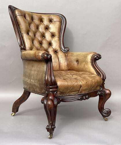 Impressive mid C19th carved mahogany library armchair