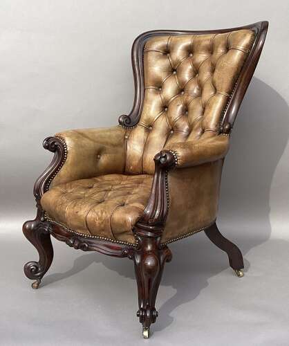 Impressive mid C19th carved mahogany library armchair
