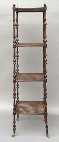 A fine Regency mahogany tapering form etagere / whatnot
