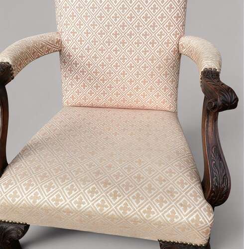 Good George II Irish carved mahogany open armchair