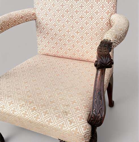Good George II Irish carved mahogany open armchair