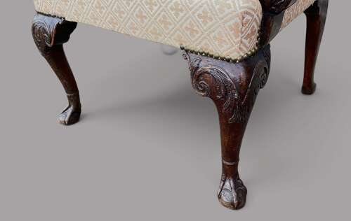 Good George II Irish carved mahogany open armchair