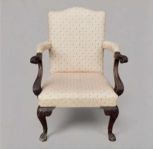 Good George II Irish carved mahogany open armchair