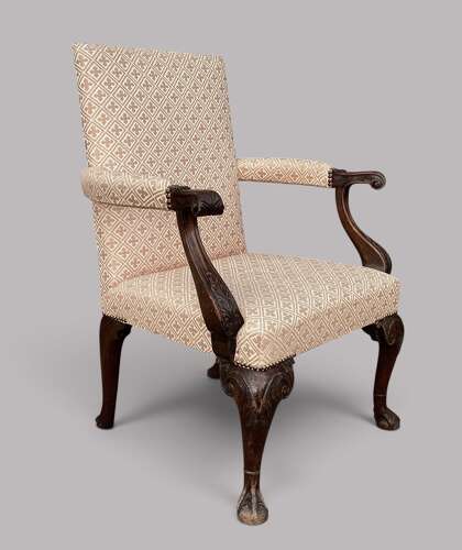 Good George II Irish carved mahogany open armchair